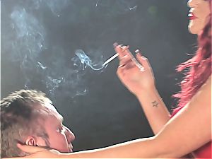 ginger-haired mega-slut dominates a dude while smoking